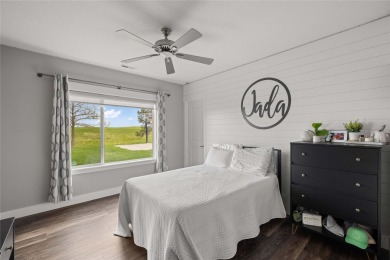 This zero-entry ranch home offers a blend of comfort and modern on Otter Creek Golf Course in Iowa - for sale on GolfHomes.com, golf home, golf lot