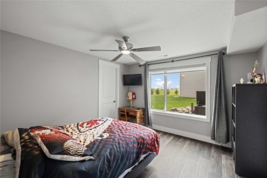 This zero-entry ranch home offers a blend of comfort and modern on Otter Creek Golf Course in Iowa - for sale on GolfHomes.com, golf home, golf lot