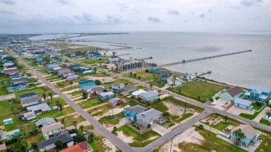 This adorable cozy coastal cottage sits on a large lot just 2 on Rockport Country Club in Texas - for sale on GolfHomes.com, golf home, golf lot