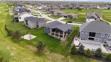 This zero-entry ranch home offers a blend of comfort and modern on Otter Creek Golf Course in Iowa - for sale on GolfHomes.com, golf home, golf lot