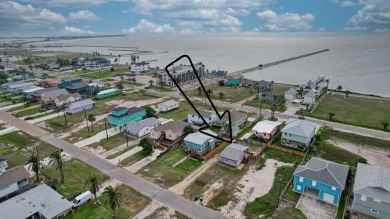 This adorable cozy coastal cottage sits on a large lot just 2 on Rockport Country Club in Texas - for sale on GolfHomes.com, golf home, golf lot