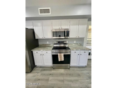 Charming End Unit Casita in Lovely Westbrook Village! Stunning on Westbrook Village Golf Club in Arizona - for sale on GolfHomes.com, golf home, golf lot