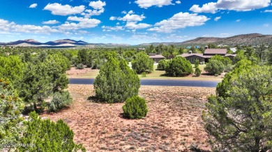 Nestled in a serene and private setting, this beautifully treed on Talking Rock Golf Club in Arizona - for sale on GolfHomes.com, golf home, golf lot