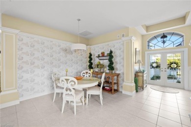 Experience the perfect blend of elegance, comfort, and charm in on Estero Country Club in Florida - for sale on GolfHomes.com, golf home, golf lot