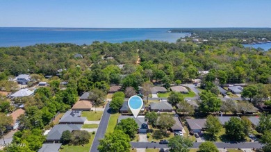 Massive corner lot home located in highly desired Mack Bayou on Sandestin Golf and Beach Resort - Raven in Florida - for sale on GolfHomes.com, golf home, golf lot