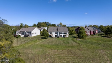 Sunsets, serenity, and a true sense of community await in this on Bay Meadows Golf Club in New York - for sale on GolfHomes.com, golf home, golf lot