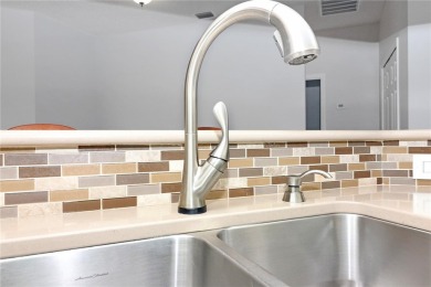 Discover this highly sought-after Opal model in Royal Highlands on Monarch At Royal Highlands in Florida - for sale on GolfHomes.com, golf home, golf lot