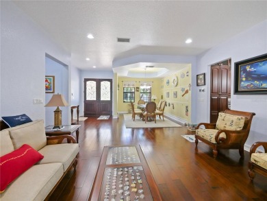 This stunning five-bedroom, four-bathroom pool home is located on Eagle Creek Golf Club in Florida - for sale on GolfHomes.com, golf home, golf lot