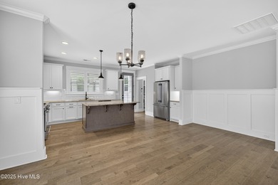 Like new home filled with upgrades now available in the sought on Cape Fear National At Brunswick Forest in North Carolina - for sale on GolfHomes.com, golf home, golf lot