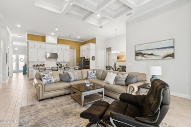 Live where every day feels like a getaway in this beautifully on Amelia National Golf and Country Club in Florida - for sale on GolfHomes.com, golf home, golf lot