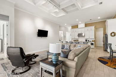 Live where every day feels like a getaway in this beautifully on Amelia National Golf and Country Club in Florida - for sale on GolfHomes.com, golf home, golf lot