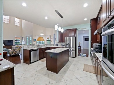 This stunning five-bedroom, four-bathroom pool home is located on Eagle Creek Golf Club in Florida - for sale on GolfHomes.com, golf home, golf lot