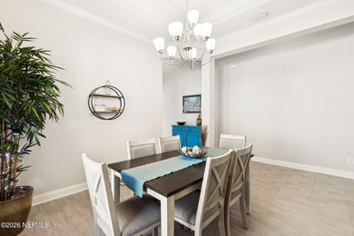 Live where every day feels like a getaway in this beautifully on Amelia National Golf and Country Club in Florida - for sale on GolfHomes.com, golf home, golf lot