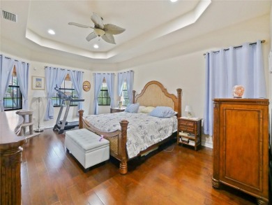 This stunning five-bedroom, four-bathroom pool home is located on Eagle Creek Golf Club in Florida - for sale on GolfHomes.com, golf home, golf lot