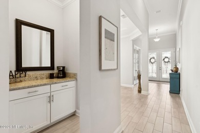 Live where every day feels like a getaway in this beautifully on Amelia National Golf and Country Club in Florida - for sale on GolfHomes.com, golf home, golf lot