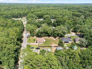 Welcome to 5951 Country Club Road -- where modern updates meet on Tanglewood Golf Club in Florida - for sale on GolfHomes.com, golf home, golf lot