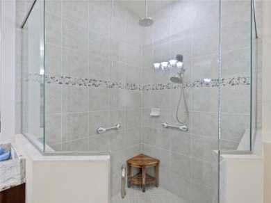 This stunning five-bedroom, four-bathroom pool home is located on Eagle Creek Golf Club in Florida - for sale on GolfHomes.com, golf home, golf lot