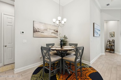 Live where every day feels like a getaway in this beautifully on Amelia National Golf and Country Club in Florida - for sale on GolfHomes.com, golf home, golf lot