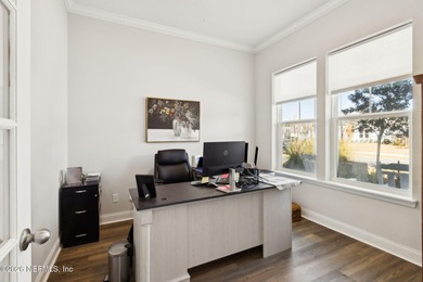 Live where every day feels like a getaway in this beautifully on Amelia National Golf and Country Club in Florida - for sale on GolfHomes.com, golf home, golf lot