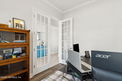 Live where every day feels like a getaway in this beautifully on Amelia National Golf and Country Club in Florida - for sale on GolfHomes.com, golf home, golf lot