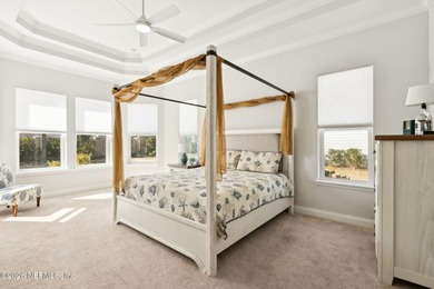 Live where every day feels like a getaway in this beautifully on Amelia National Golf and Country Club in Florida - for sale on GolfHomes.com, golf home, golf lot