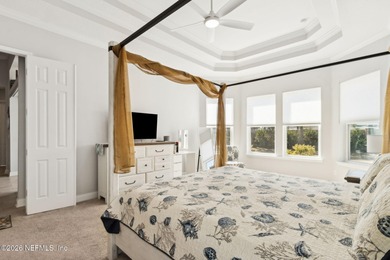 Live where every day feels like a getaway in this beautifully on Amelia National Golf and Country Club in Florida - for sale on GolfHomes.com, golf home, golf lot