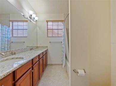 This stunning five-bedroom, four-bathroom pool home is located on Eagle Creek Golf Club in Florida - for sale on GolfHomes.com, golf home, golf lot