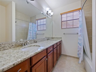 This stunning five-bedroom, four-bathroom pool home is located on Eagle Creek Golf Club in Florida - for sale on GolfHomes.com, golf home, golf lot