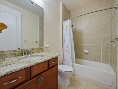 This stunning five-bedroom, four-bathroom pool home is located on Eagle Creek Golf Club in Florida - for sale on GolfHomes.com, golf home, golf lot