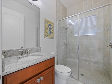 This stunning five-bedroom, four-bathroom pool home is located on Eagle Creek Golf Club in Florida - for sale on GolfHomes.com, golf home, golf lot