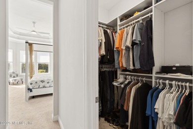 Live where every day feels like a getaway in this beautifully on Amelia National Golf and Country Club in Florida - for sale on GolfHomes.com, golf home, golf lot