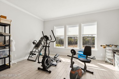 Live where every day feels like a getaway in this beautifully on Amelia National Golf and Country Club in Florida - for sale on GolfHomes.com, golf home, golf lot