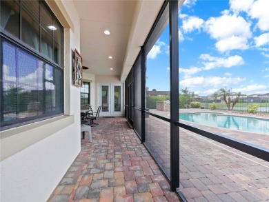 This stunning five-bedroom, four-bathroom pool home is located on Eagle Creek Golf Club in Florida - for sale on GolfHomes.com, golf home, golf lot