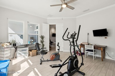 Live where every day feels like a getaway in this beautifully on Amelia National Golf and Country Club in Florida - for sale on GolfHomes.com, golf home, golf lot