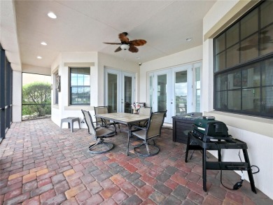 This stunning five-bedroom, four-bathroom pool home is located on Eagle Creek Golf Club in Florida - for sale on GolfHomes.com, golf home, golf lot