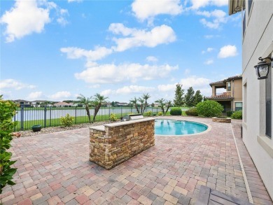 This stunning five-bedroom, four-bathroom pool home is located on Eagle Creek Golf Club in Florida - for sale on GolfHomes.com, golf home, golf lot