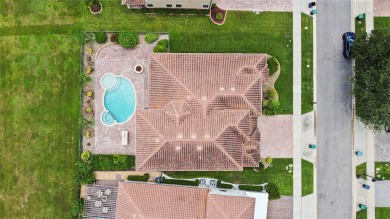 This stunning five-bedroom, four-bathroom pool home is located on Eagle Creek Golf Club in Florida - for sale on GolfHomes.com, golf home, golf lot
