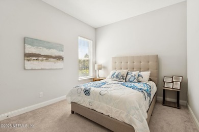 Live where every day feels like a getaway in this beautifully on Amelia National Golf and Country Club in Florida - for sale on GolfHomes.com, golf home, golf lot