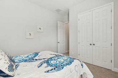 Live where every day feels like a getaway in this beautifully on Amelia National Golf and Country Club in Florida - for sale on GolfHomes.com, golf home, golf lot