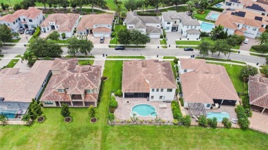 This stunning five-bedroom, four-bathroom pool home is located on Eagle Creek Golf Club in Florida - for sale on GolfHomes.com, golf home, golf lot