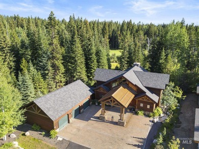 Experience the perfect fusion of classic log craftsmanship and on McCall Municipal Golf Course in Idaho - for sale on GolfHomes.com, golf home, golf lot