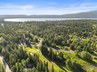 Experience the perfect fusion of classic log craftsmanship and on McCall Municipal Golf Course in Idaho - for sale on GolfHomes.com, golf home, golf lot