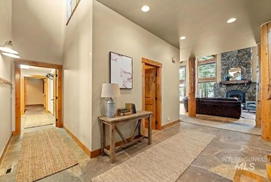 Experience the perfect fusion of classic log craftsmanship and on McCall Municipal Golf Course in Idaho - for sale on GolfHomes.com, golf home, golf lot