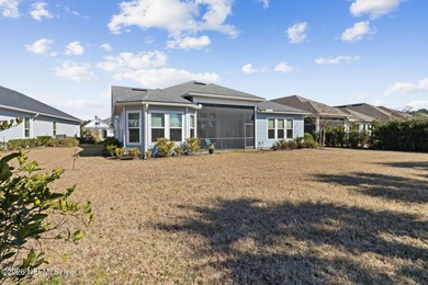 Live where every day feels like a getaway in this beautifully on Amelia National Golf and Country Club in Florida - for sale on GolfHomes.com, golf home, golf lot