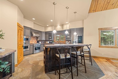 Experience the perfect fusion of classic log craftsmanship and on McCall Municipal Golf Course in Idaho - for sale on GolfHomes.com, golf home, golf lot