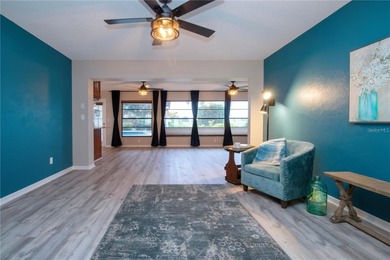 Under contract-accepting backup offers. Live the Florida dream on Sandpiper Golf Club in Florida - for sale on GolfHomes.com, golf home, golf lot