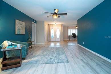 Under contract-accepting backup offers. Live the Florida dream on Sandpiper Golf Club in Florida - for sale on GolfHomes.com, golf home, golf lot