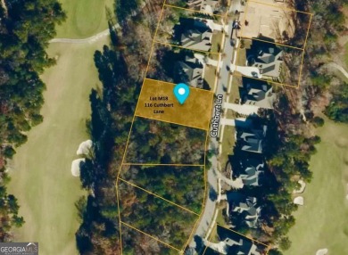 This beautiful wooded lot is located on the golf course in the on The Governors Towne Club in Georgia - for sale on GolfHomes.com, golf home, golf lot