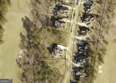This beautiful wooded lot is located on the golf course in the on The Governors Towne Club in Georgia - for sale on GolfHomes.com, golf home, golf lot