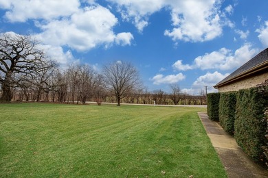 This well-maintained home is perfectly positioned on a spacious on St. Andrews Golf and Country Club in Illinois - for sale on GolfHomes.com, golf home, golf lot